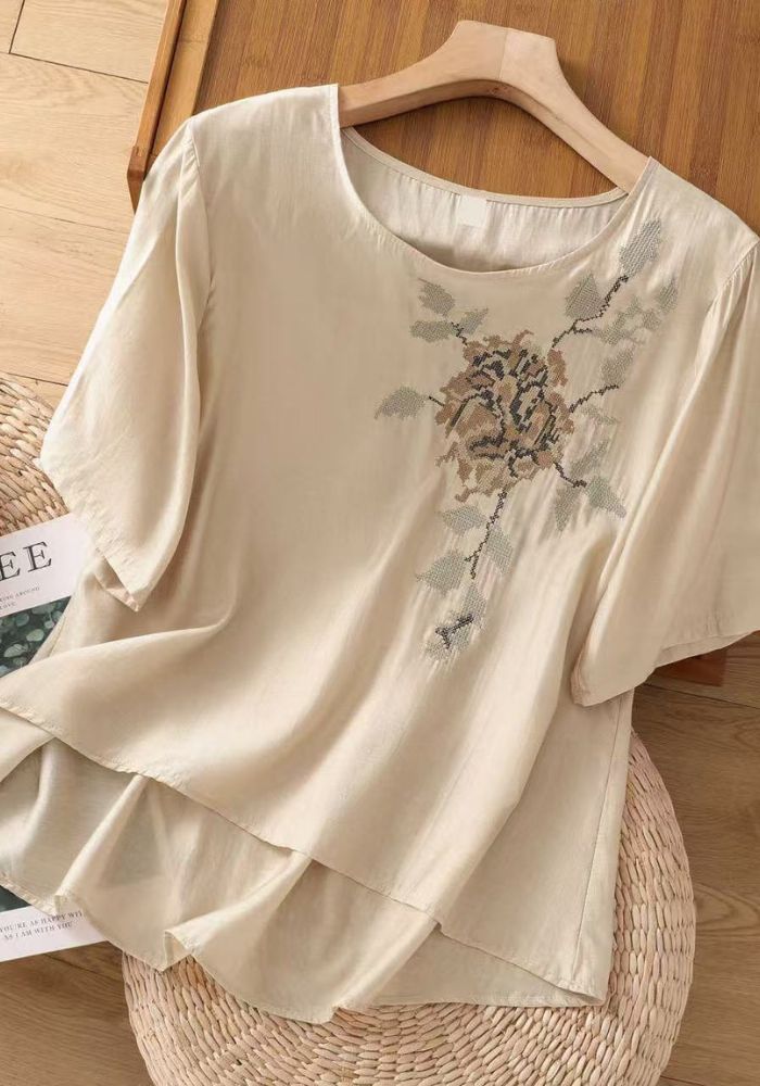 Floral embroidered tunic top styled with palazzo pants