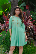Green rayon tunic with heavy embroidery for women