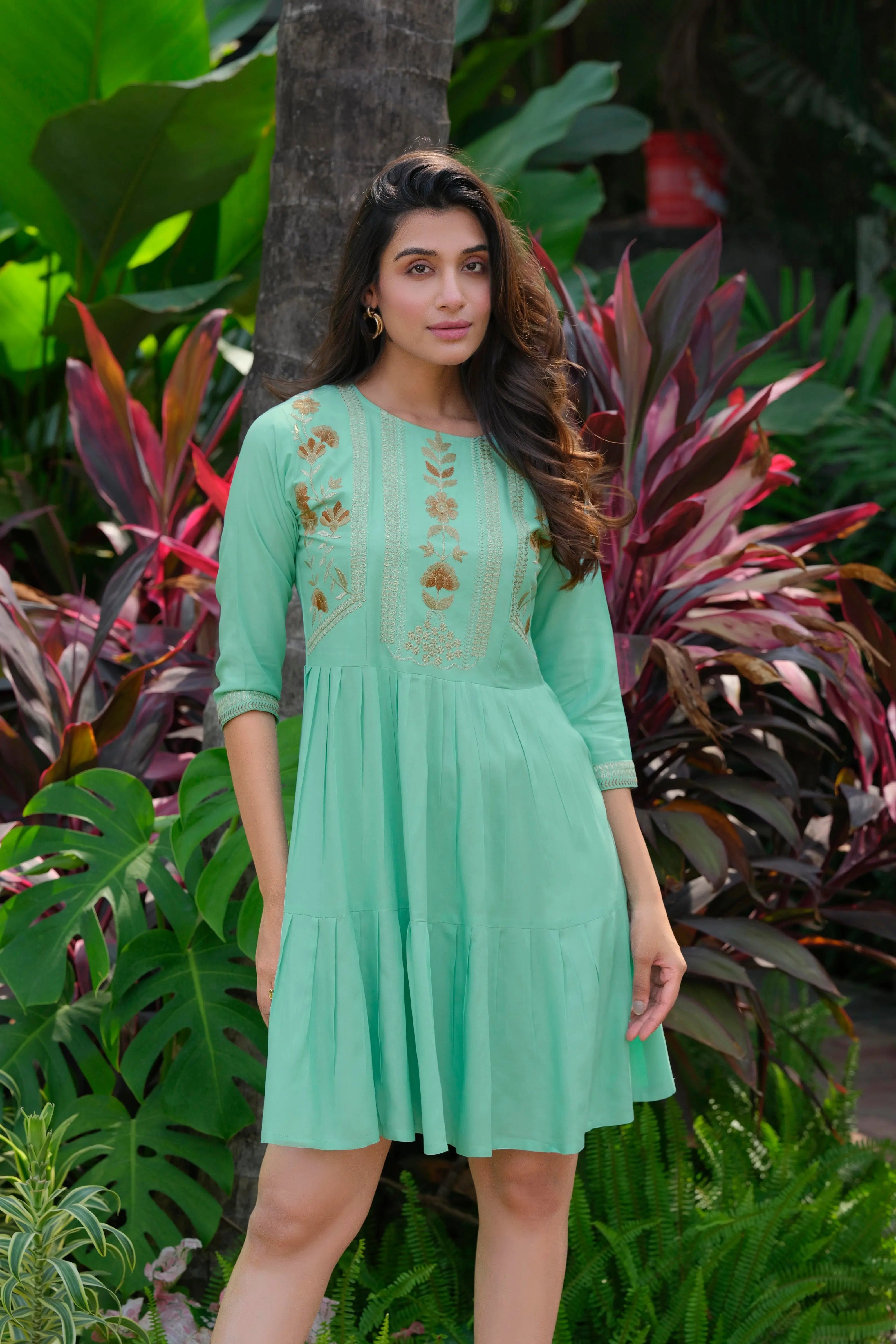 Green rayon tunic with heavy embroidery for women