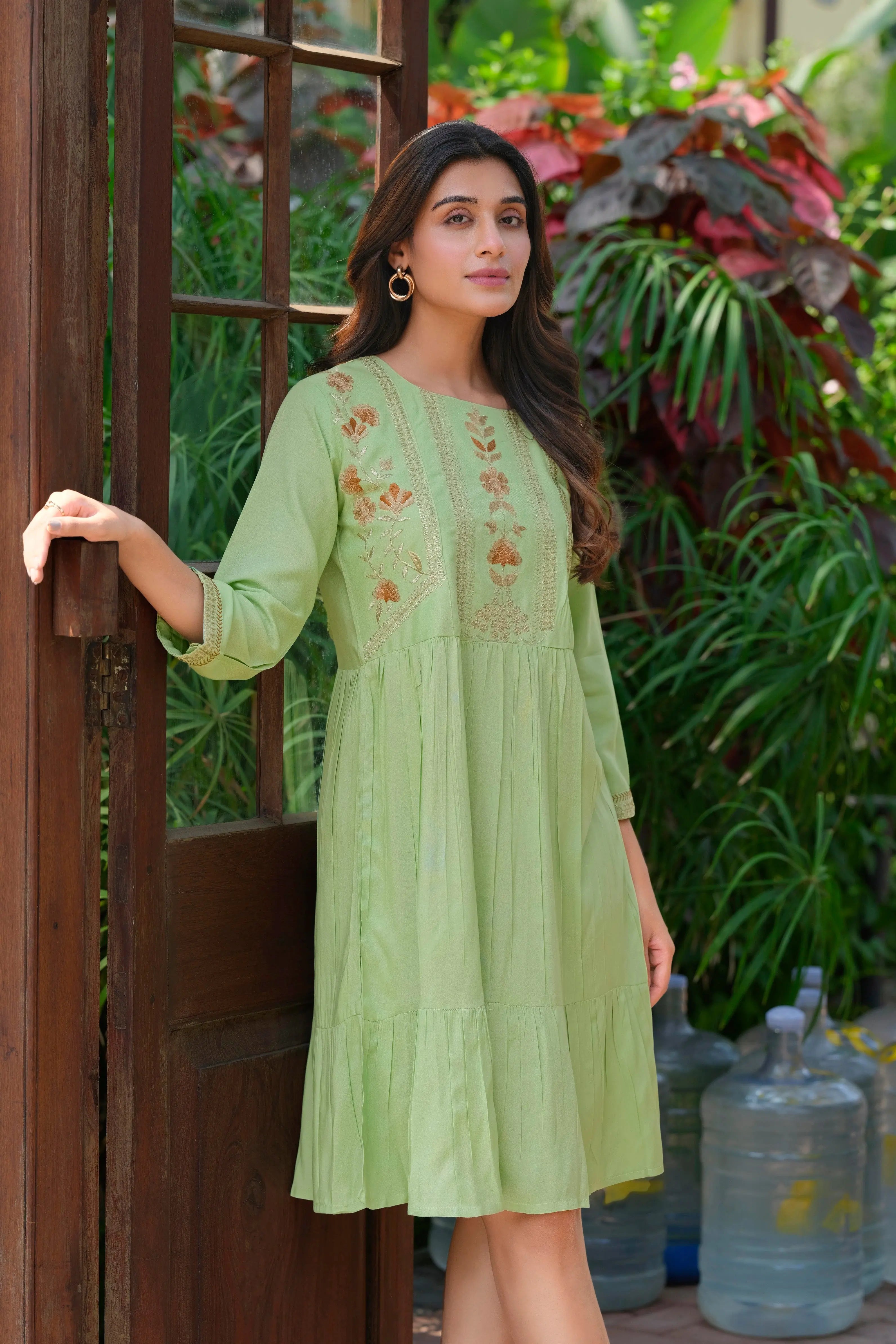 Pista green rayon tunic with heavy embroidery for women